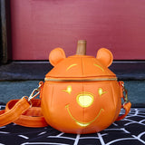 Loungefly Premium DISNEY
Winnie the Pooh Pumpkin Glow In The Dark Crossbody Bag