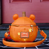 Loungefly Premium DISNEY
Winnie the Pooh Pumpkin Glow In The Dark Crossbody Bag